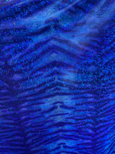 Load image into Gallery viewer, iridescent Hologram R/blue tiger design spandex stretch for all 4 sides 58/60 wide sold by the yard
