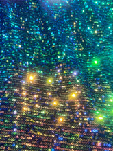 Load image into Gallery viewer, Green/gold Mini Iridescent Sequins Stretch On 4 Way Black Stretch Mesh Sequins Fabric By Yard
