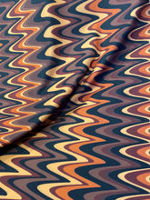 Load image into Gallery viewer, Multi color Wave Designs Print Bronw spandex fabric stretches to all 4 sides sold by yards
