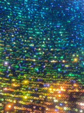 Load image into Gallery viewer, Green/gold Mini Iridescent Sequins Stretch On 4 Way Black Stretch Mesh Sequins Fabric By Yard
