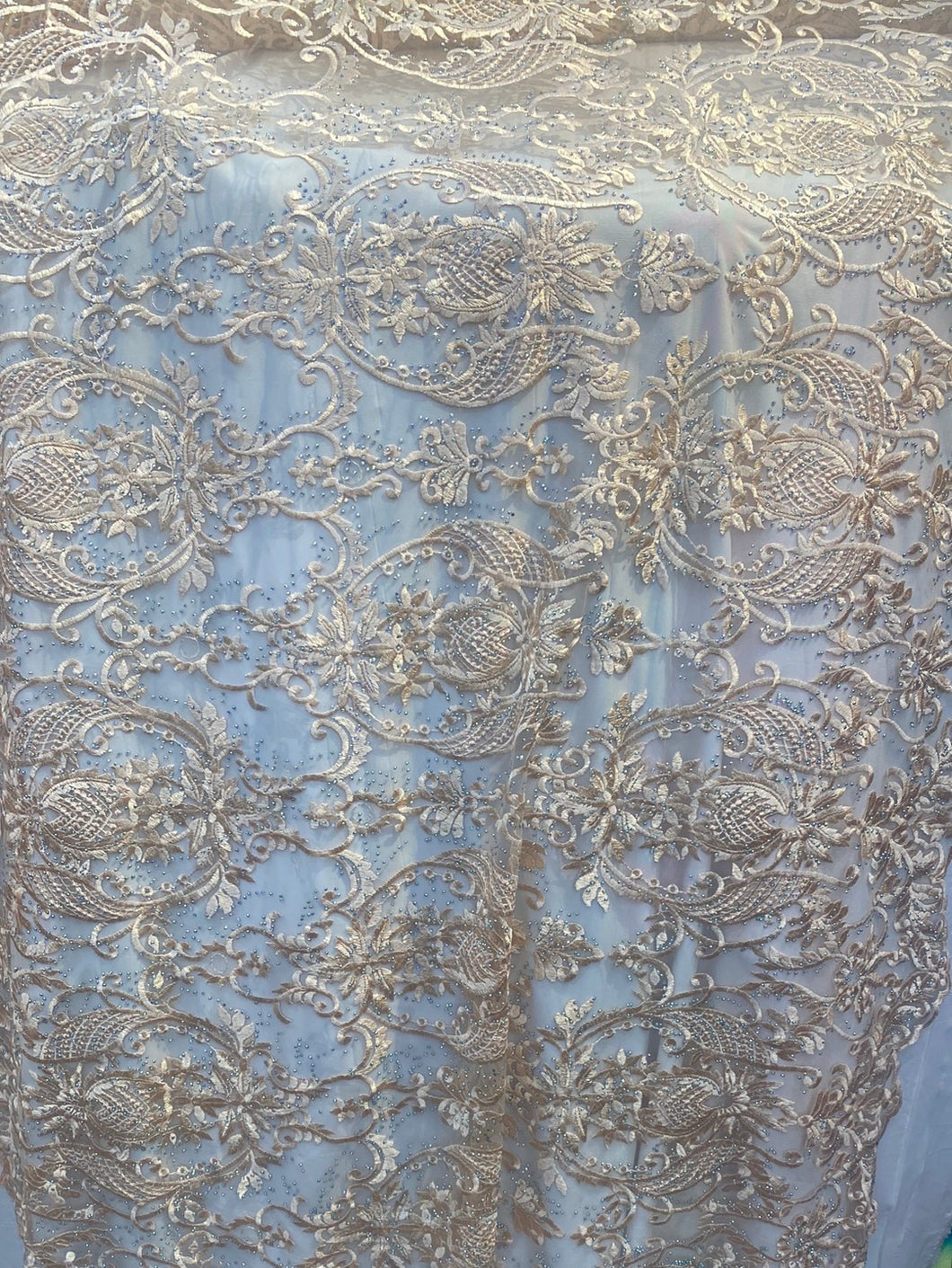 peach embroidered lace with rhinestonesMesh sold by the yard