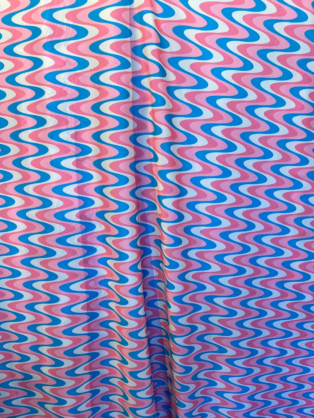 Wave Designs Print white/blue/pink  spandex fabric stretches to all 4 sides sold by yards