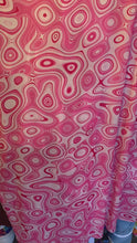 Load and play video in Gallery viewer, Wave Designs Prints Pink spandex fabric stretches to all 4 sides sold by yards
