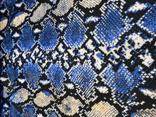 Load image into Gallery viewer, Techno Spandex Blue white Fabric Snake Designs By The Yard.
